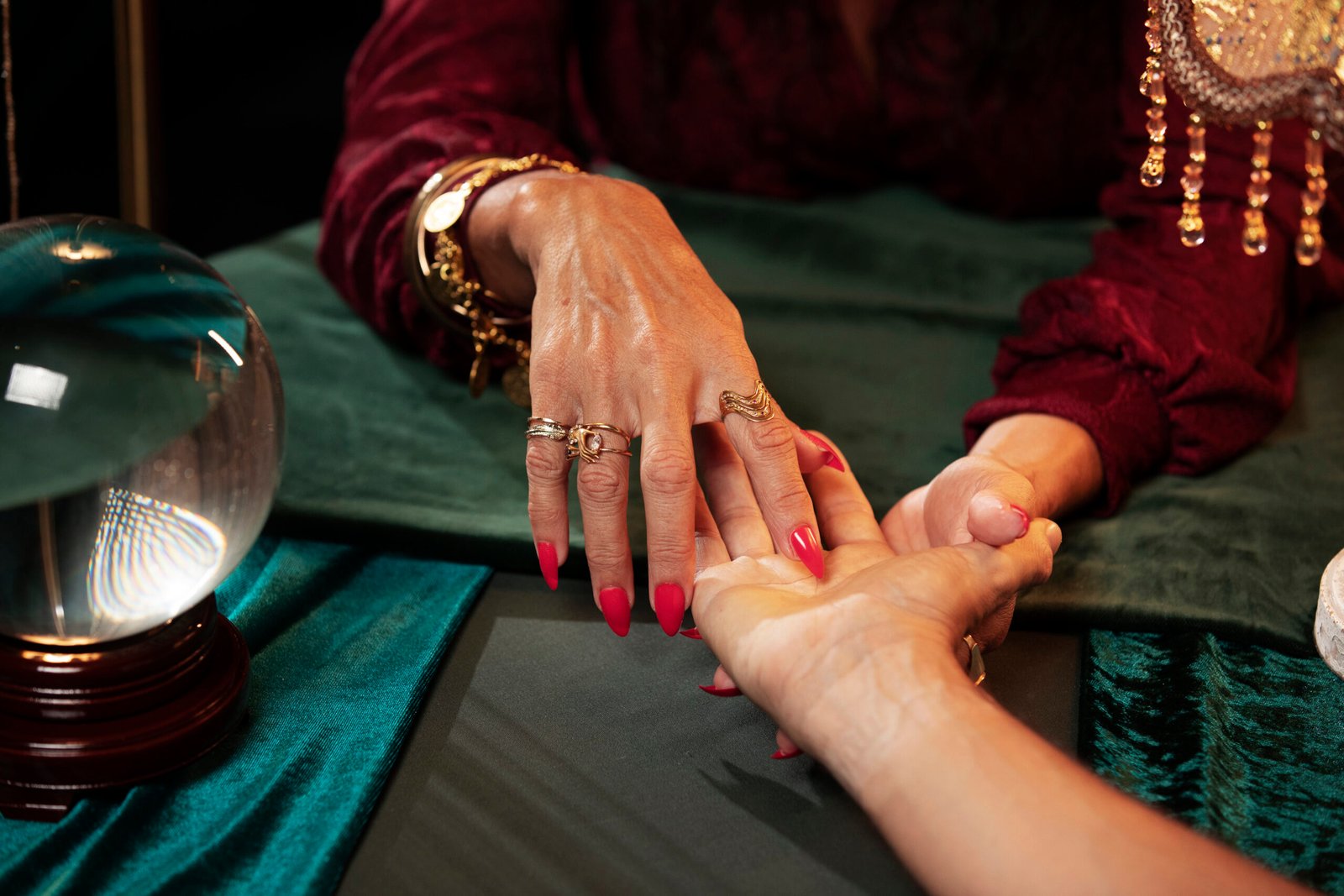 high-angle-fortune-teller-palm-reading.jpg